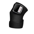 Masseur articulaire SwissTouch et son câble de charge