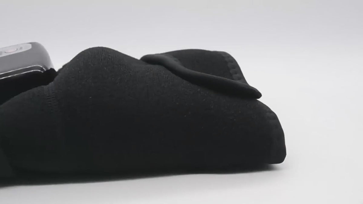 masseur articulaire SwissTouch déplié, sangles élastiques et surface intérieure